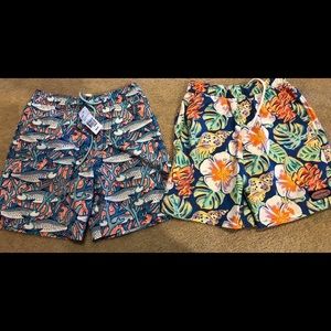 Two vineyard vines boys bathing suits